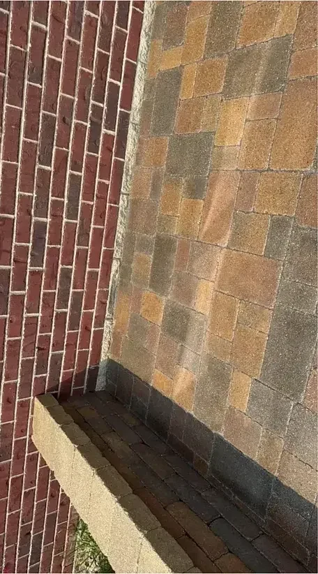 The same pavers after cleaning and sealing, with the original color back